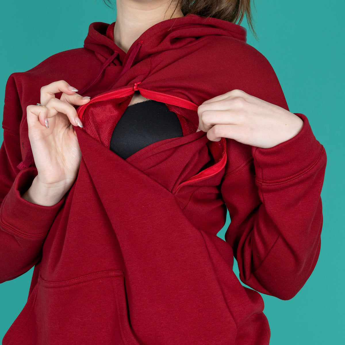 photo showing the zip breastfeeding access on the burgundy hoodie 