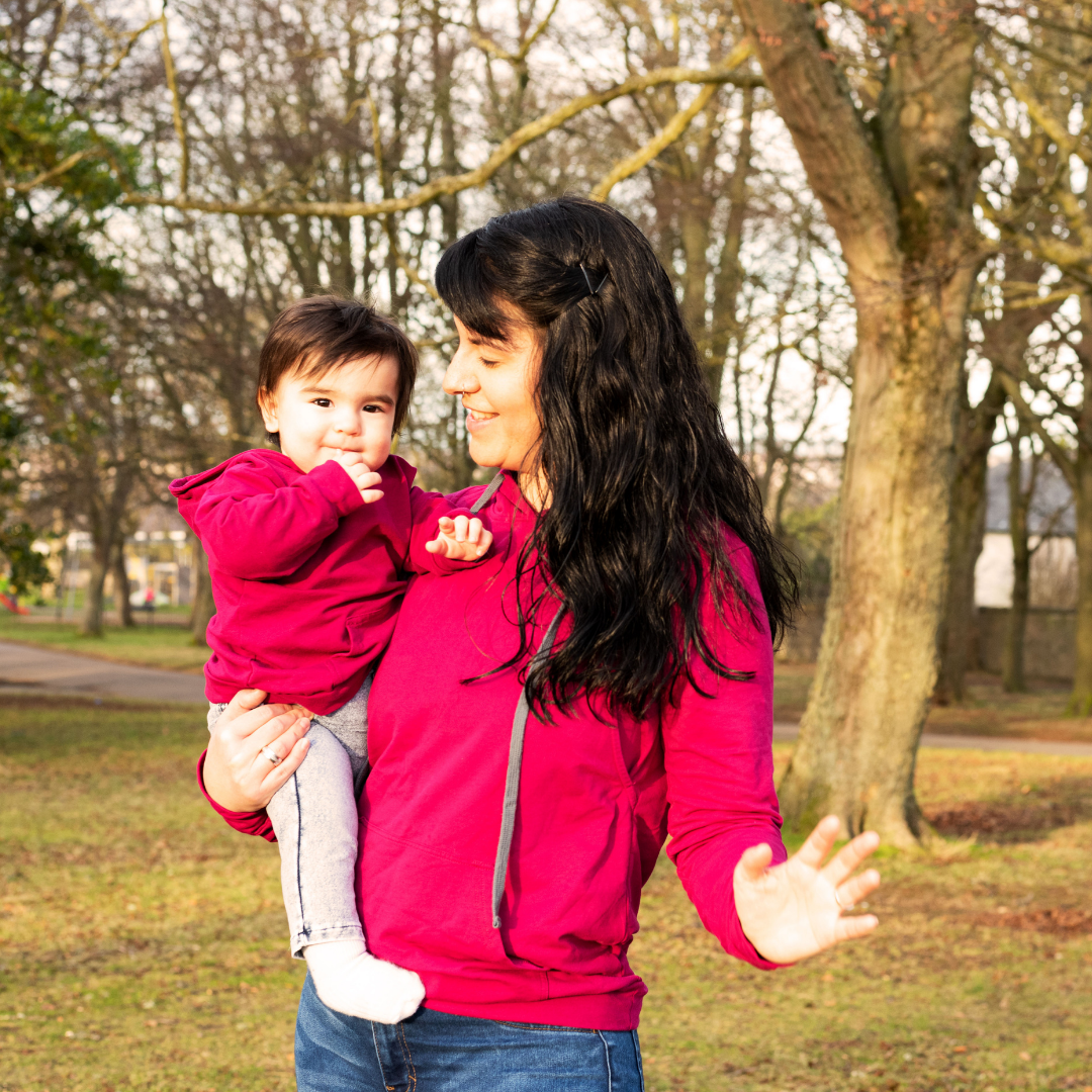 stylish mum twinning breastfeeding mum and child hoodies in raspberry colour